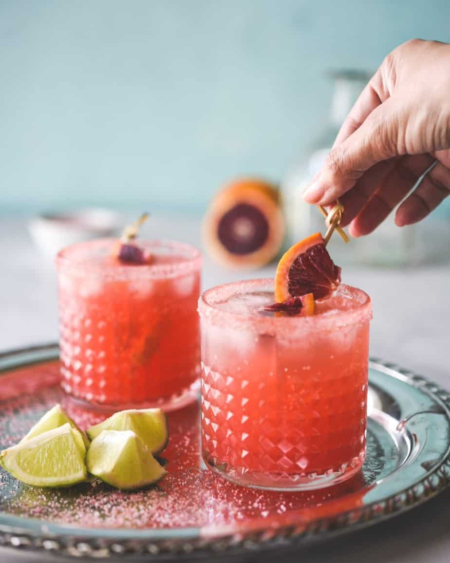 This is the best blood orange margarita, with fresh blood orange and lime juice,Tequila and Topo Chico.