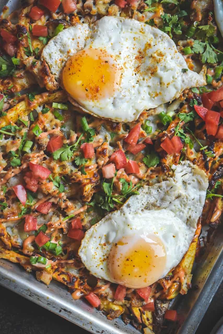 Loaded Cheesy Fries with fried egg and Pollo Asado