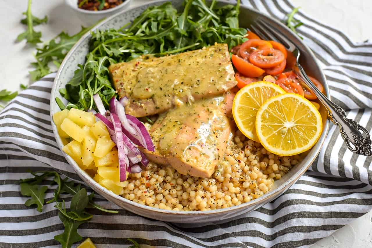Roasted Garlic Butter Baked Salmon with Couscous and Pineapple Vinaigrette