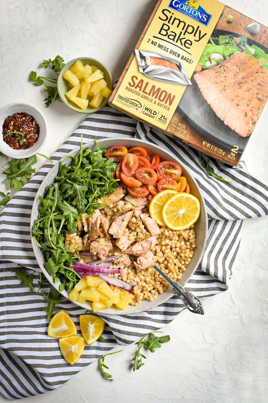 Roasted Garlic Butter Baked Salmon with Couscous and Pineapple Vinaigrette
